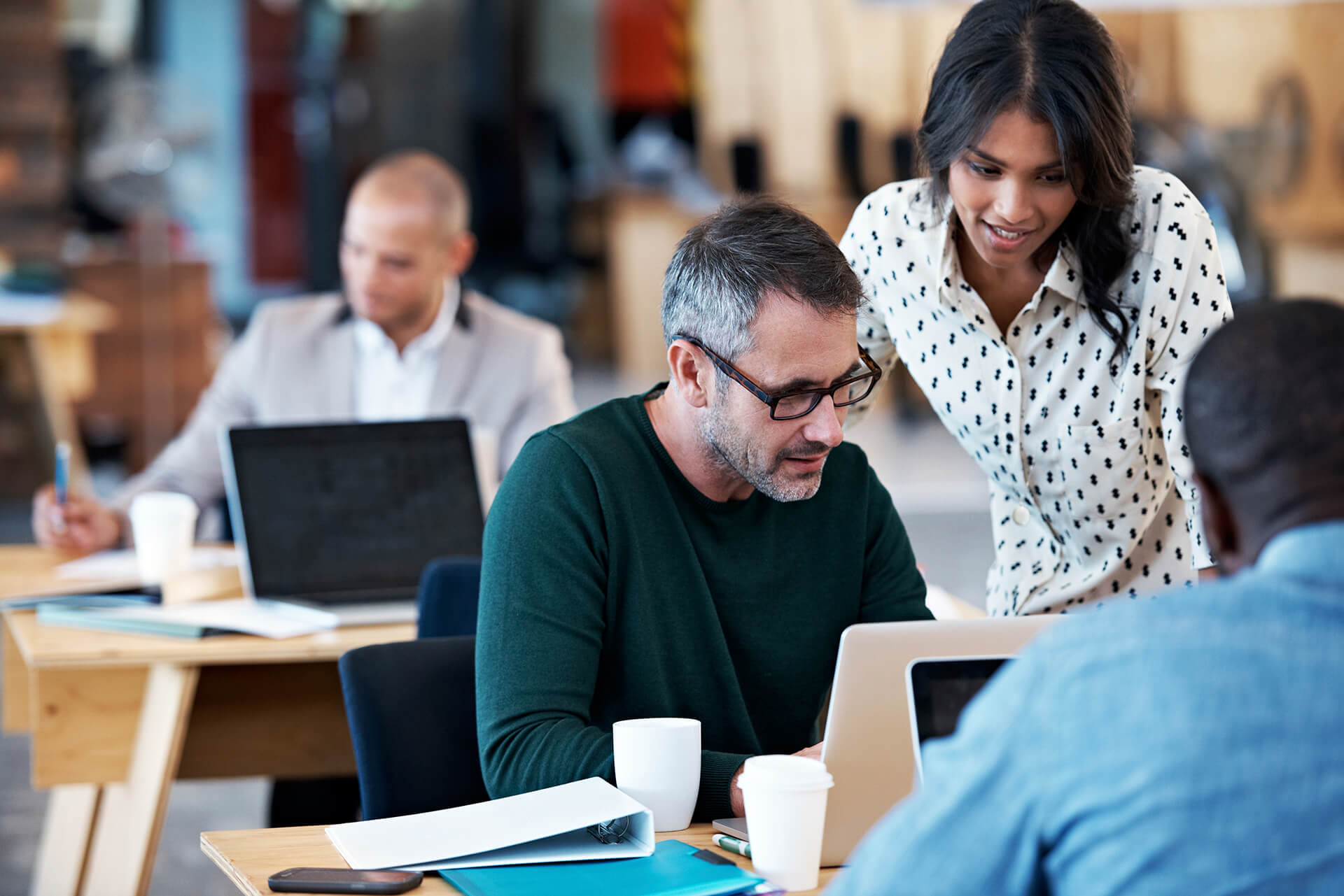 Man and woman working with Provance ITSM software